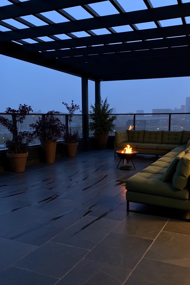 Rooftop terrace lounge with central fire pit, green modular sofa, potted plants under wooden pergola