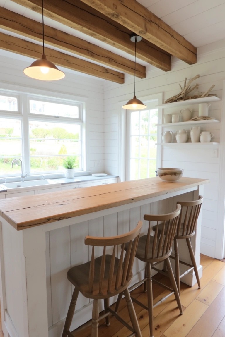 White shiplap bar area with exposed ceiling beams, thick wood countertop, matching bar stools, and simple pendant lights