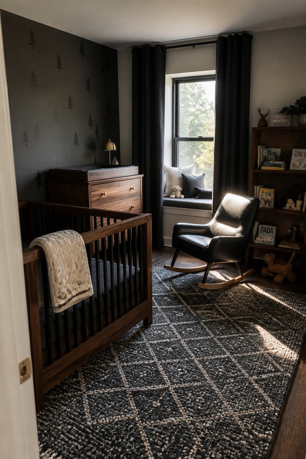 Modern nursery with dark wood crib, black rocker, patterned rug, and tree wall.