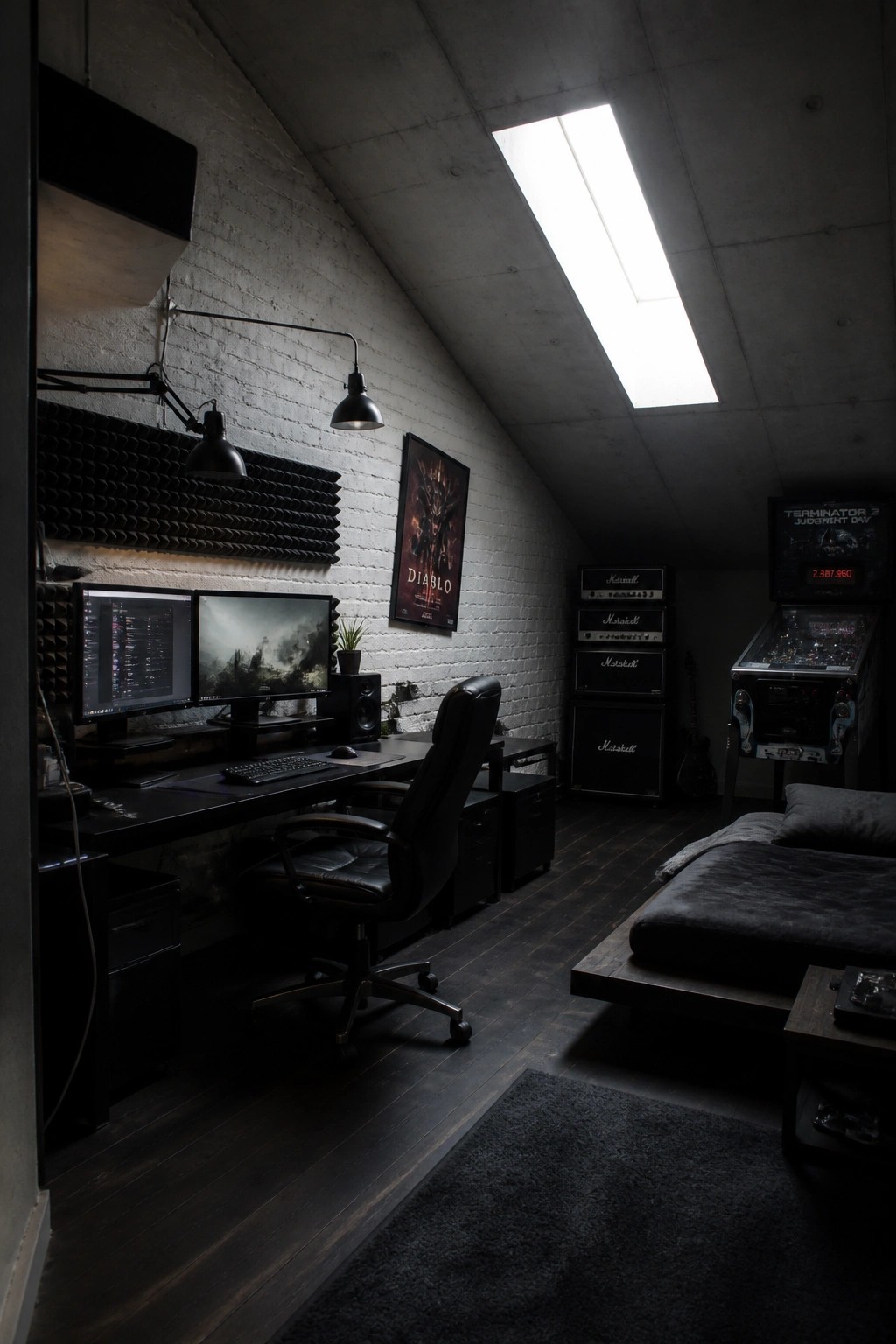Dark attic gaming room with dual monitors, black chair, Marshall amps, and pinball machine.