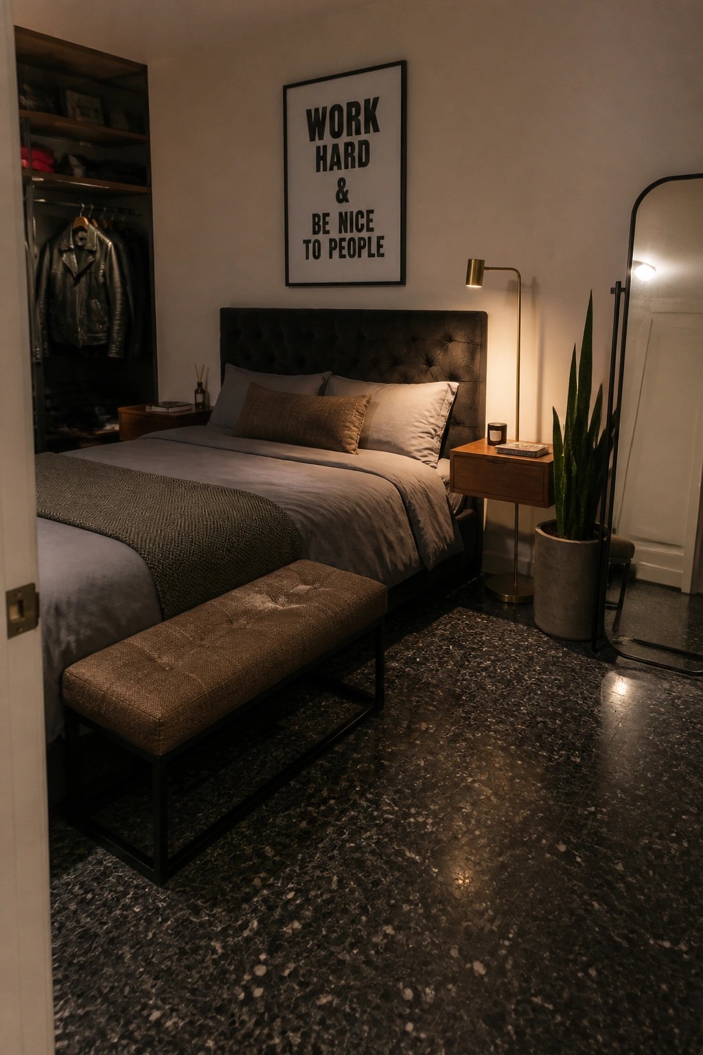 Modern bedroom with tufted bed, brown bench, motivational poster, mirror, and potted plant