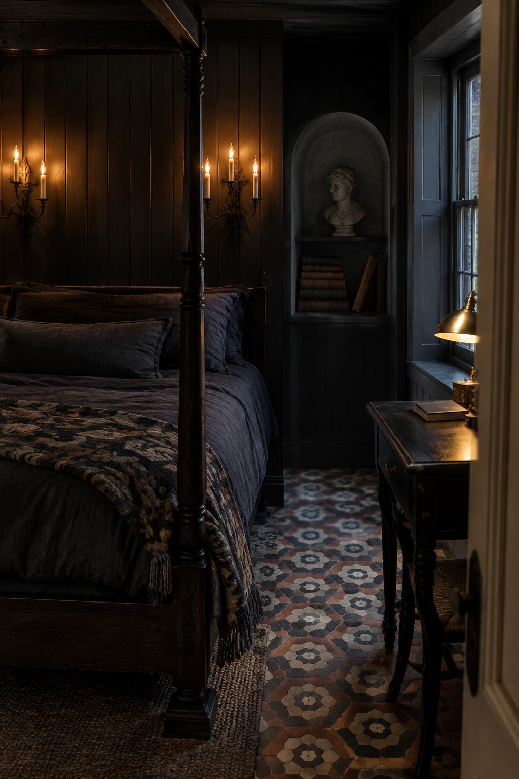 A dark paneled bedroom with a four-poster bed, patterned tile floor, built-in shelves, and a desk beside a window.
